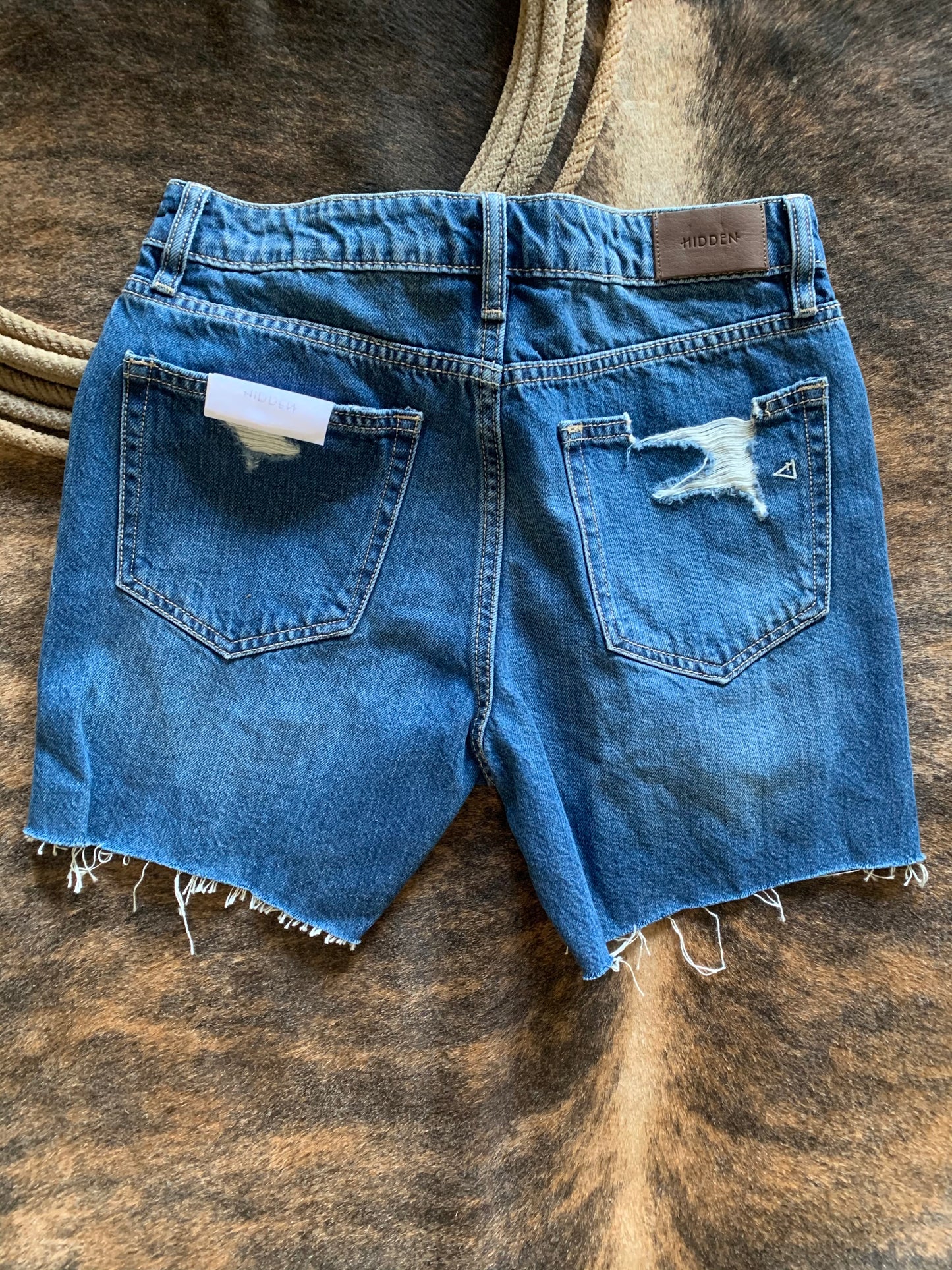 High rise distressed denim shorts